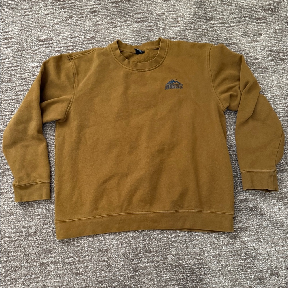 Women’s Large Hurley sweatshirt. Dirt brown color with dark blue logo.